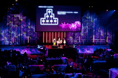Flower gobos projected onto the stage's curtains and the floors.