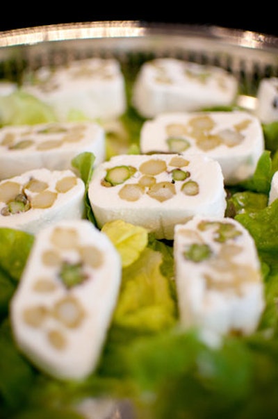 Servers passed hors d'oeuvres such as goat cheese and asparagus canapés from Victor Restaurant & Bar.