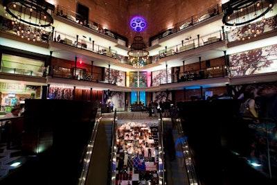 The party took over the hotel's second-floor lobby, while the catwalk, DJ booth, and the Beets' performance space converged on the third floor. Neon gels were placed on the floor lights to create a different look.