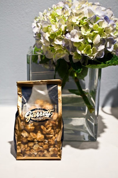 The shopping event featured simple hydrangea centerpieces, and guests muched on Rowley's favorite snack, Garrett Popcorn.