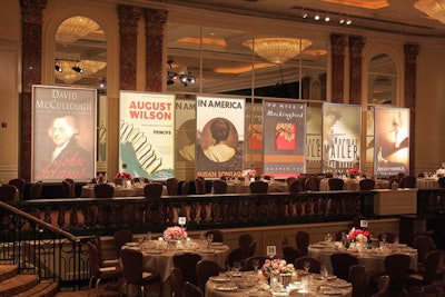 Blowups of book covers and playbills served as decor.