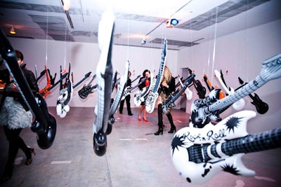New York artist Agathe Snow created a room strung with inflatable guitars.