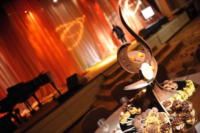 An ornate piece of chocolate sat in the center of each dessert centerpiece.