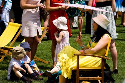 Guests who bought tickets for the event lounged in Veuve Clicquot-branded chairs, and many donned hats and summer suits for the occasion.