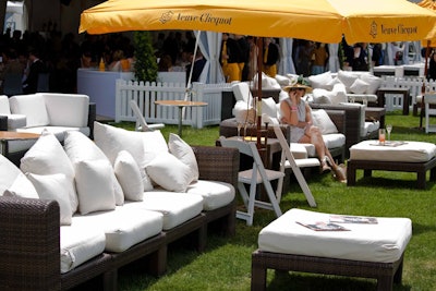 The tented section for V.I.P.s like Madonna, LL Cool J, Chloe Sevigny, and Governor David Paterson, was set with custom-built banquettes and ottomans, shaded by large umbrellas, and surrounded by a picket fence.
