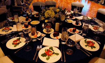 Waitstaff preplated the salad and dessert to reduce distractions in the ballroom during the program.