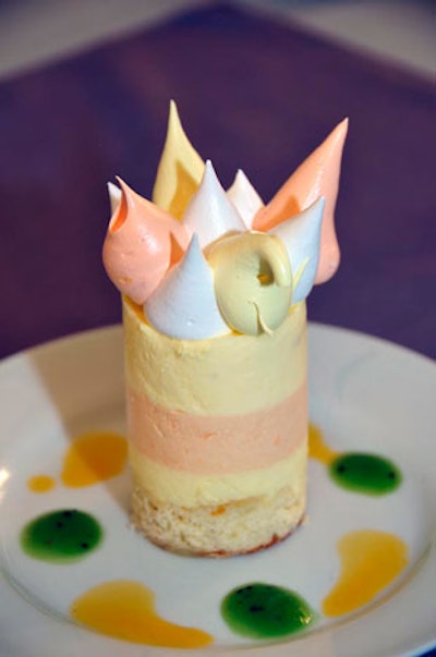 For dessert, Limelight Catering prepared a lemon, blood orange, and Italian sponge cake tower topped with spiky bursts of meringue.