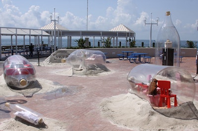 TH Outdoor placed the bottles in various positions to create the effect that they had washed up on the shore.