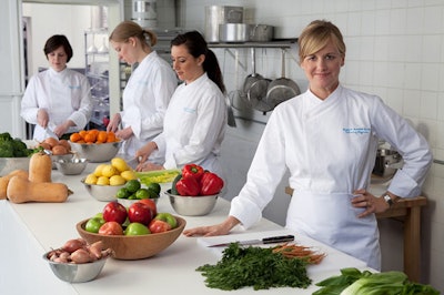 Cover and her staff work in a commercial kitchen in Brooklyn.