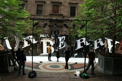 Large light boxes showing photographs of the Burberry sign acted as a backdrop for the arrivals area.