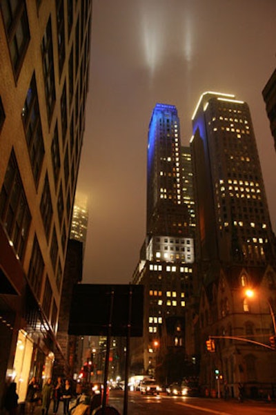 Equipment on three different buildings and the street produced a light show for the event. To ensure that guests could see the illuminated signs, Van Wyck & Van Wyck built a floor above the existing terraces.