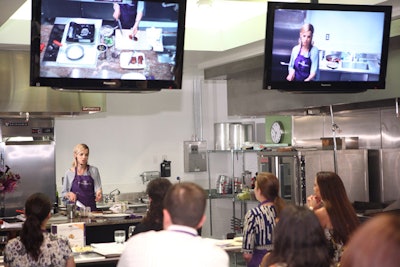 Host and cookbook author Trish Magwood demonstrated how Anytime Gourmet is prepared and served. Jack Lucky topped the tables with purple calla lilies, sweet pea, stock, and orchids.