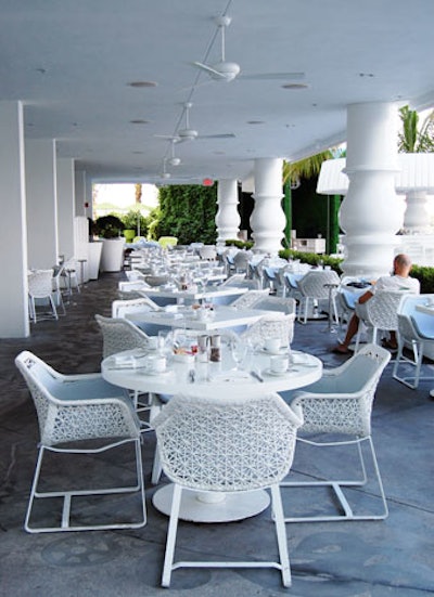 Asia de Cuba's covered terrace offers seating with views of the pool and Biscayne Bay.