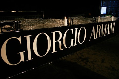 Bartenders served wine and beer in the Giorgio Armani lounge.
