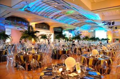 Blue and green lighting filled the Samuel Hall Currelly Gallery, where 620 guests dined on a meal prepared by Daniel et Daniel Event Creation & Catering.