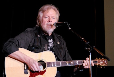 Randy Bachman performed after dinner, singing hits like 'Takin' Care of Business.'