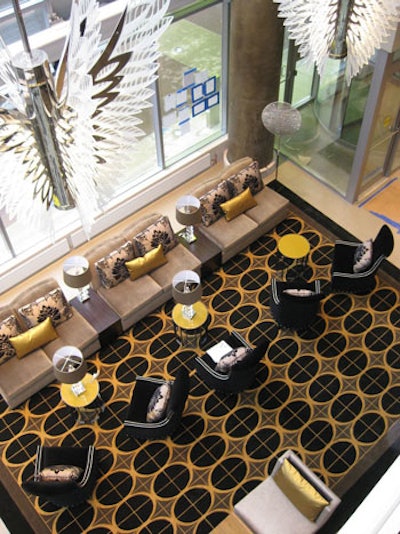 Winged chandeliers hang over the main lobby.