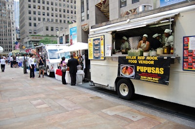 Guests dined from food trucks lining the upper level of Rockefeller Center.