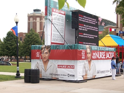 Unseasonably cool temperatures in Chicago meant staffers at Navy Pier had to wear hoodies under their Nurse Jackie scrubs.