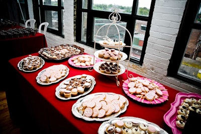 A dessert table included cupcakes and cookies from Nino D'Aversa Bakery and Prettysweet.