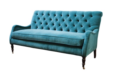 Peacock blue velvet tufted sofa, $495, available in the New York area, Washington, and Boston from Bridge Furniture & Props
