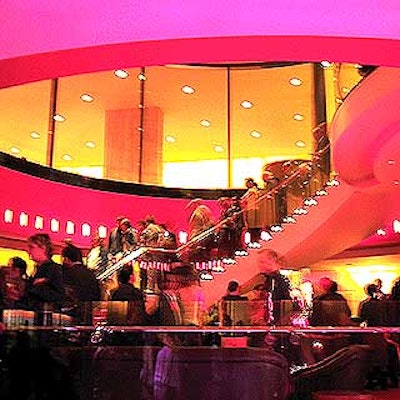 Brasserie 8 1/2's dramatic central staircase--which slightly echoes the Absolutely Fabulous set--was lit with votive candles.