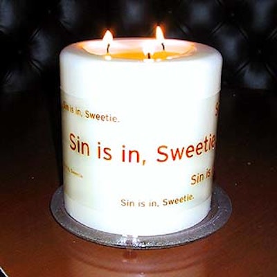 Large pillar candles were decorated with the tagline for the Comedy Central's new Absolutely Fabulous ads: 'Sin is in, sweetie.'