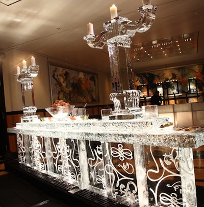 A 14-foot-long ice sculpture topped with two ice candelabra displayed a seafood buffet in the dining room.