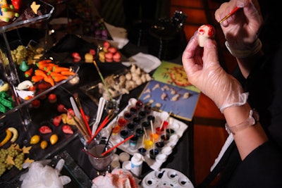 To add to the interactive element, a marzipan artist painted candies in bright colors as guests looked on.
