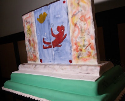 Cakes shaped like German landmarks such as the Berlin Wall served as centerpieces in various rooms.