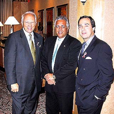 MPI president and CEO Edwin Griffin Jr., Hilton New York general manager Peter Kretschmann and MPI Foundation chairman Mark Sirangelo.
