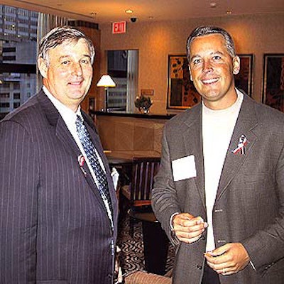 NYC & Company's Greg Gibadlo and Wyndham Hotels' David Johnson at the Hilton New York's 44th floor executive lounge.