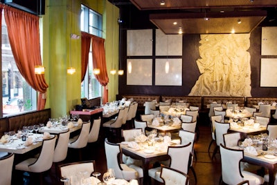 Dark wood, Italian leather, marble tables, and a large Greco-Roman statue set the mood at the Black Olive.