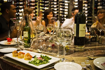 The glass-encased wine cellar hosts private dinners for 10.