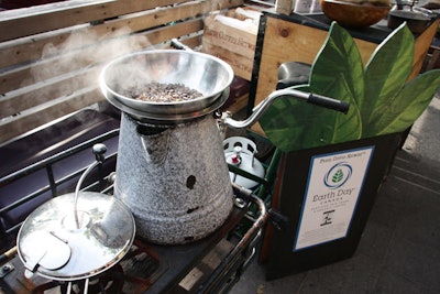 A bike-powered coffee roaster from the Fresh Coffee Network prepared organic beans for coffee served later in the evening.