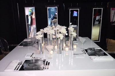 Well Dunn Catering's table channeled Diana Ross's 'Reflections' with mirrored panels and glass accessories.