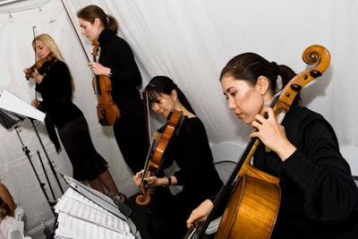 A string quartet from Dolce Vita Strings played as each bride walked down the aisle.