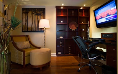Both of the vice presidential suites have dark wood floors and work areas equipped with multimedia plug-in capabilities.