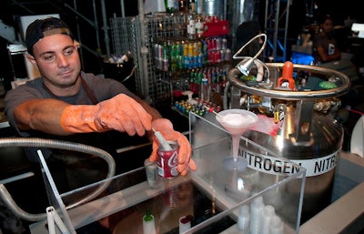 Bartenders served Nitro Rum and Coke cocktails in an eight-ounce Coca-Cola can.