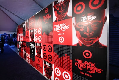The press wall at the step and repeat featured the album cover, Target bull's-eyes, and the band's logo.