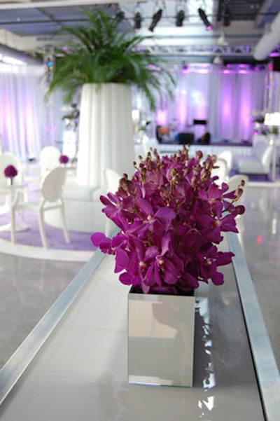 Purple accents, including arrangements from Forget Me Not Flowers, filled the urban lounge.