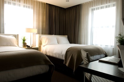 Each of the hotel's 225 guest rooms is equipped with work stations and free wireless Internet.