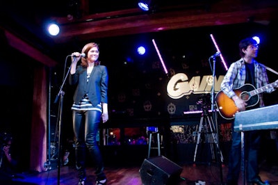On a stage splashed with Gain gobos, Mandy Moore performed an hourlong set that included her best-known song, 'Candy.'