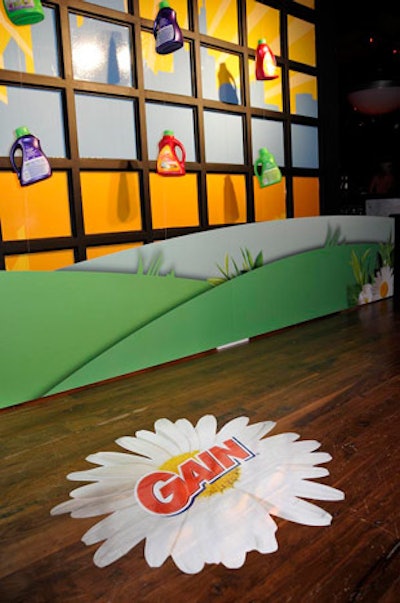 Vinyl floor logos and hanging detergent bottles decorated the entrance to LaSalle Power Co.'s third-floor performance area.