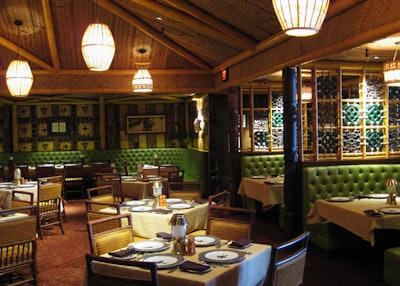 Green banquettes add splashes of color.