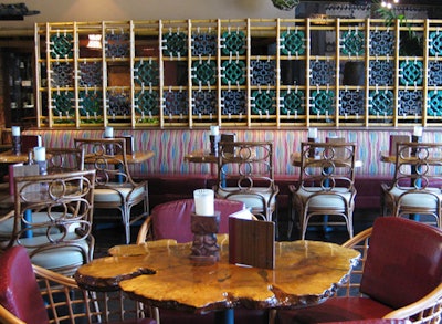Tiki-style decor and props decorate the space.
