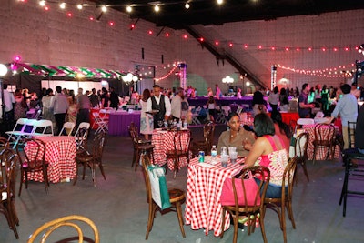 Light strings hung overhead and checked cloths topped tables in one area.