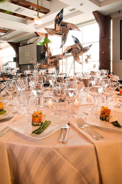 Silver pinwheels served as each table's centerpiece as well as take-home items for guests.