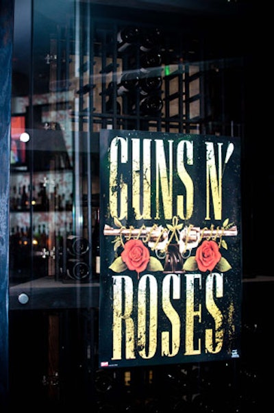 Posters advertising bands like Guns N' Roses, Alice Cooper, and Led Zepplin added to the rock 'n' roll theme.
