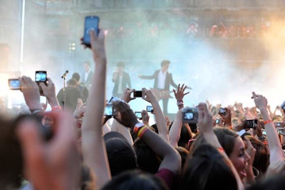 Set creator Michael Parks—who goes by the name Spike—designed a stage that enabled fans to get up close to artists like Jonas Brothers.